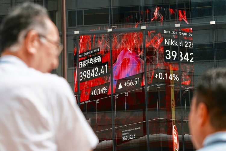 World shares are mostly down as Trump’s tariff deadline looms, while U.S. stocks set records